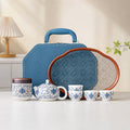 Blue lotus porcelain Gongfu Chinese tea set with teapot, teacups, tea canister, tray, and blue gift bag