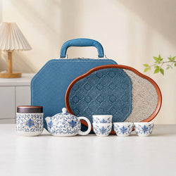 Blue lotus porcelain Gongfu Chinese tea set with teapot, teacups, tea canister, tray, and blue gift bag