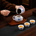 Blue lotus porcelain tea canister used for adding loose leaf tea to a Gongfu teapot during tea preparation