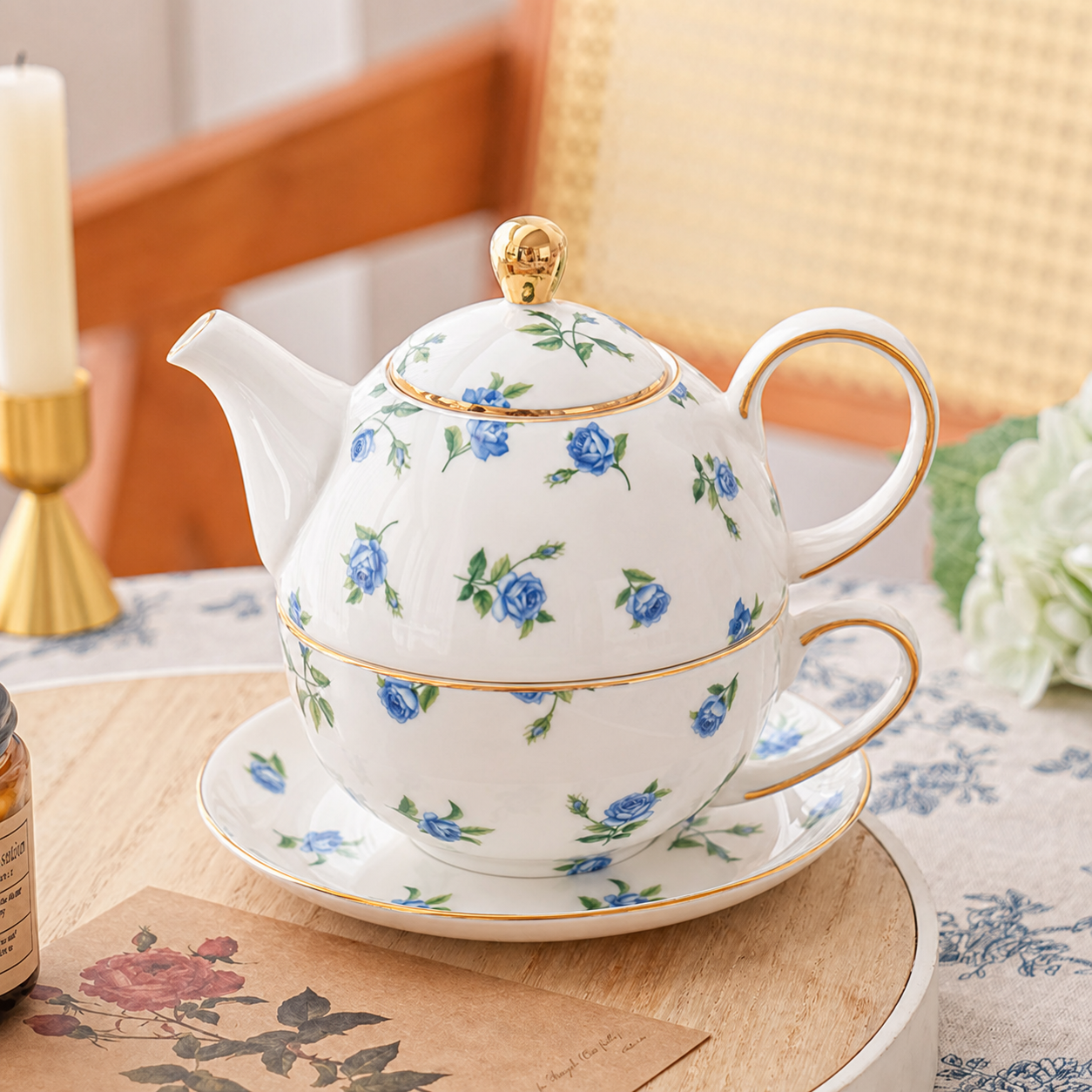 Stacked blue rose teapot cup and saucer with gold trim