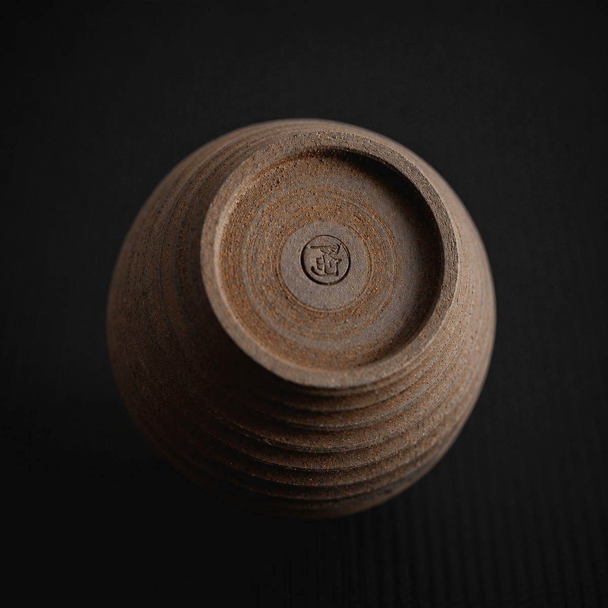 Bottom detail of rustic ceramic tea cup